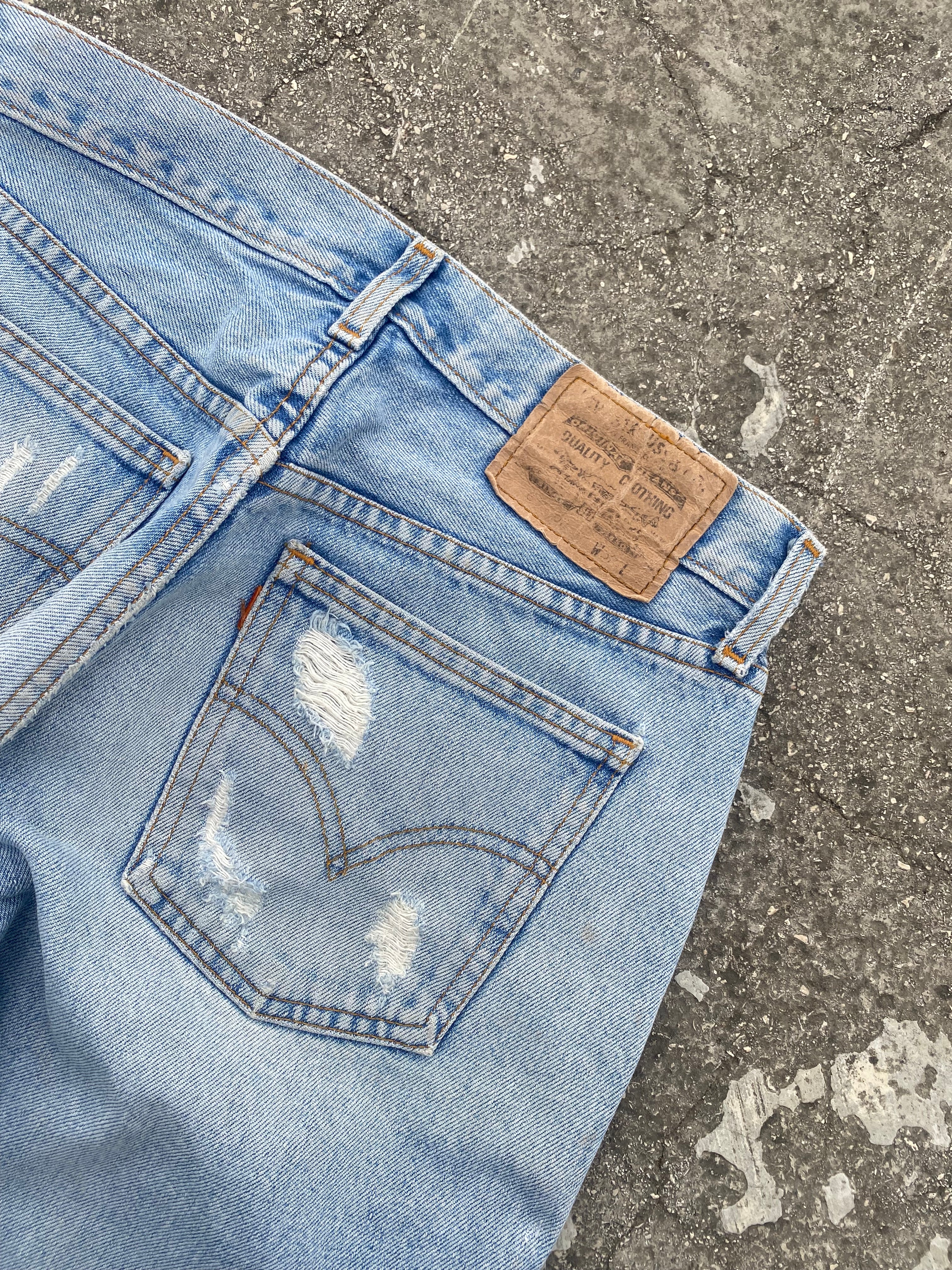 1990’S LEVI’S ORANGE TAB 614 (W30)